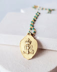 Virgin Mary Medal With Turquoise green Beaded Necklace.