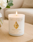 Sacred Heart of Jesus candle in a coffee table at home