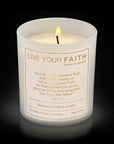 Candle with Bible verse John 1:14 blurred background