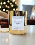 Emmanuel scented prayer candle in a gold vessel. 7oz.