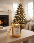 Emmanuel Christmas candle on a cozy modern living room
