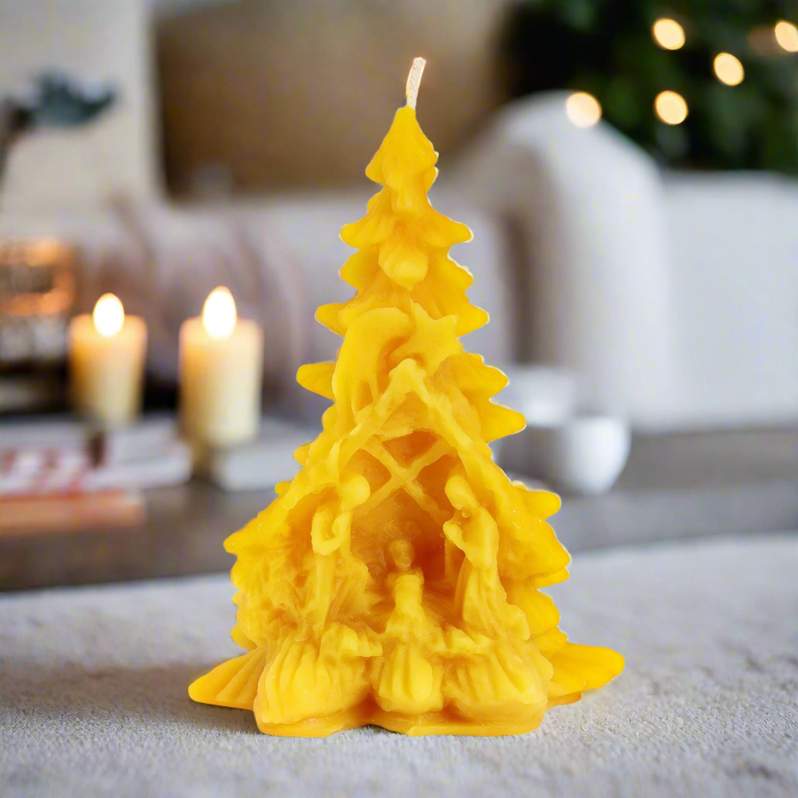 pine tree beeswax candle with nativity scene