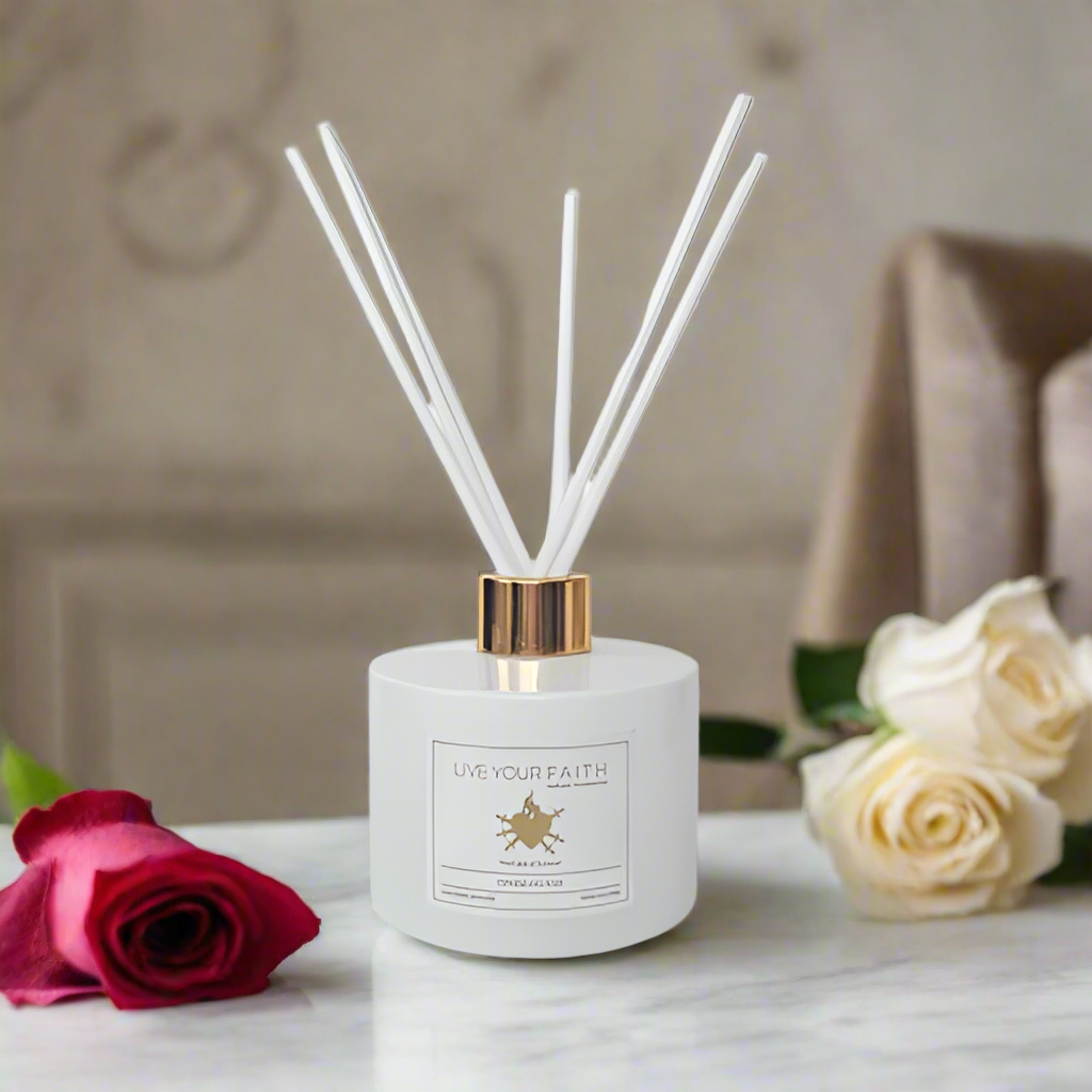 white Our Lady of Sorrows Diffuser with roses and neutral background