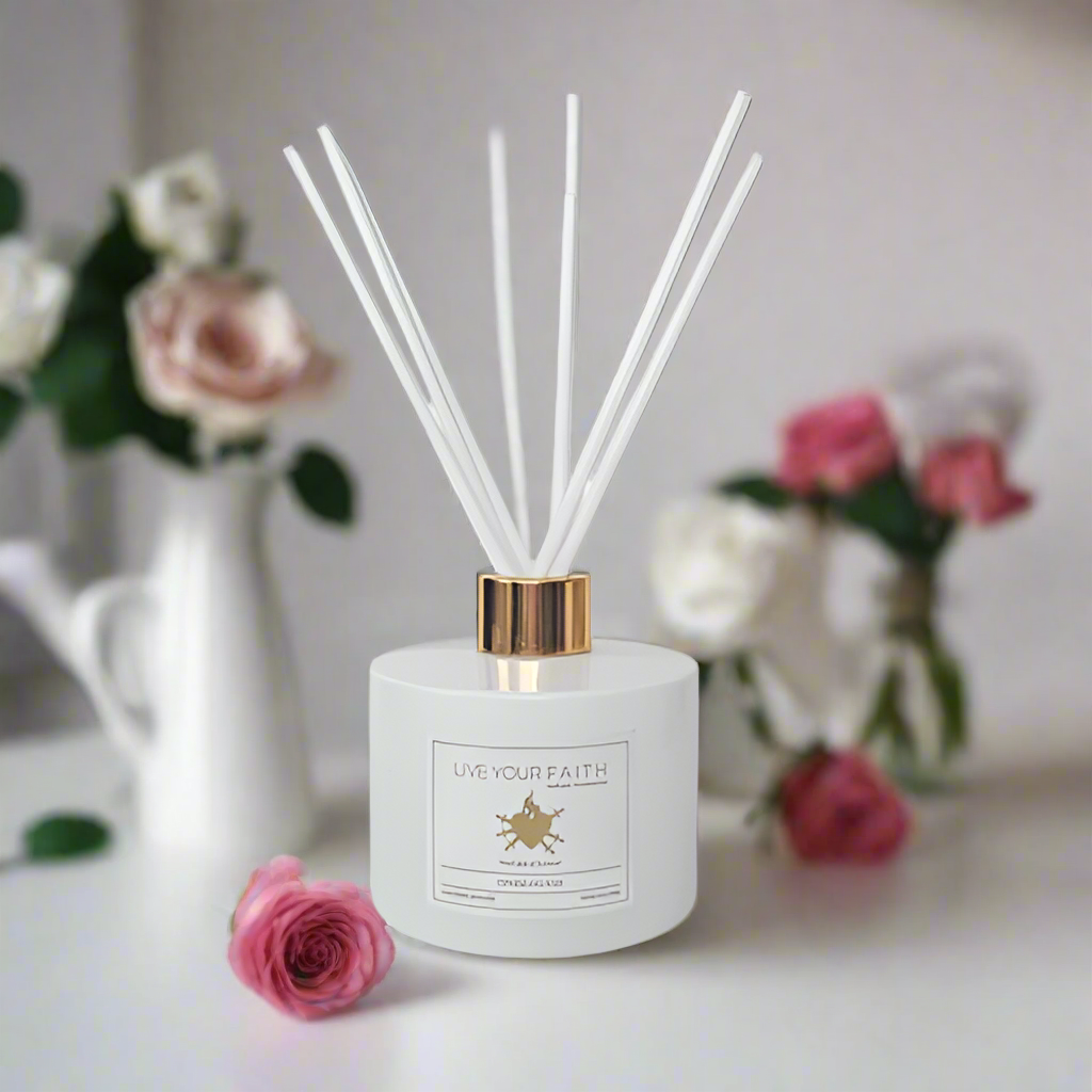 Our lady of sorrows diffuser with flowers on a white background