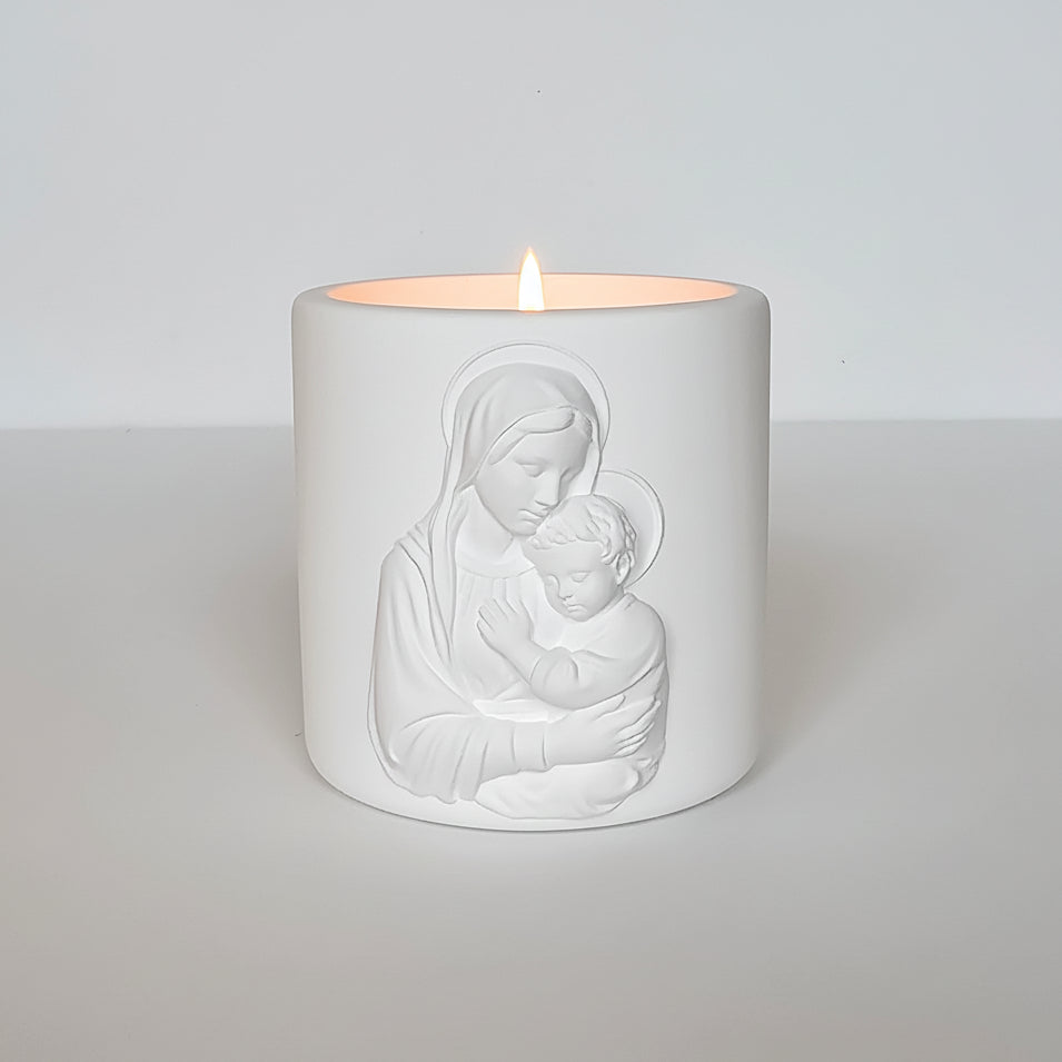 Lady's Embrace 6oz luxury cashmere white jar candle featuring the Virgin Mary holding baby Jesus by Live Your Faith Catholic in Camarillo,California.