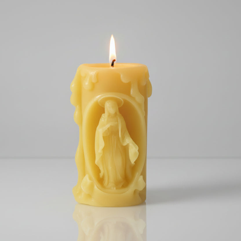 Beeswax Yellow candle with a figurine of Virgin Mary design on white background