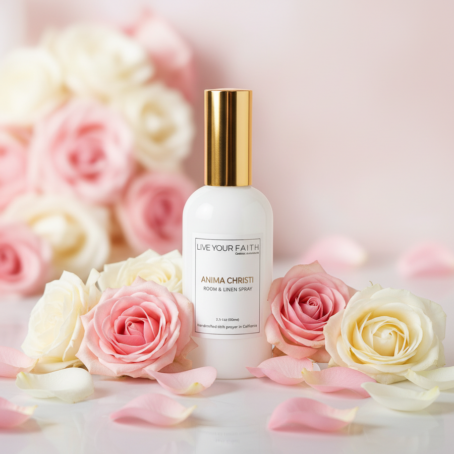 Catholic gift Anima Christi Room spray bottle with gold cap on a background of pink and white roses