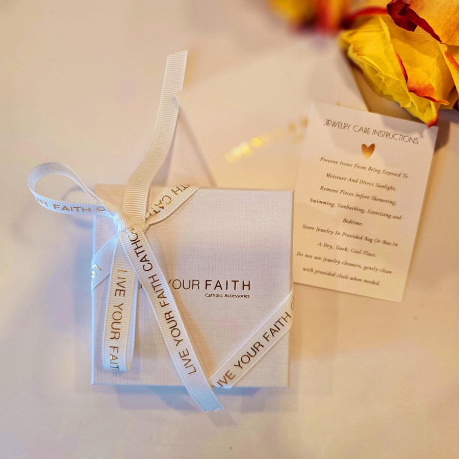 live your faith catholic packaging with jewelry caring instructions