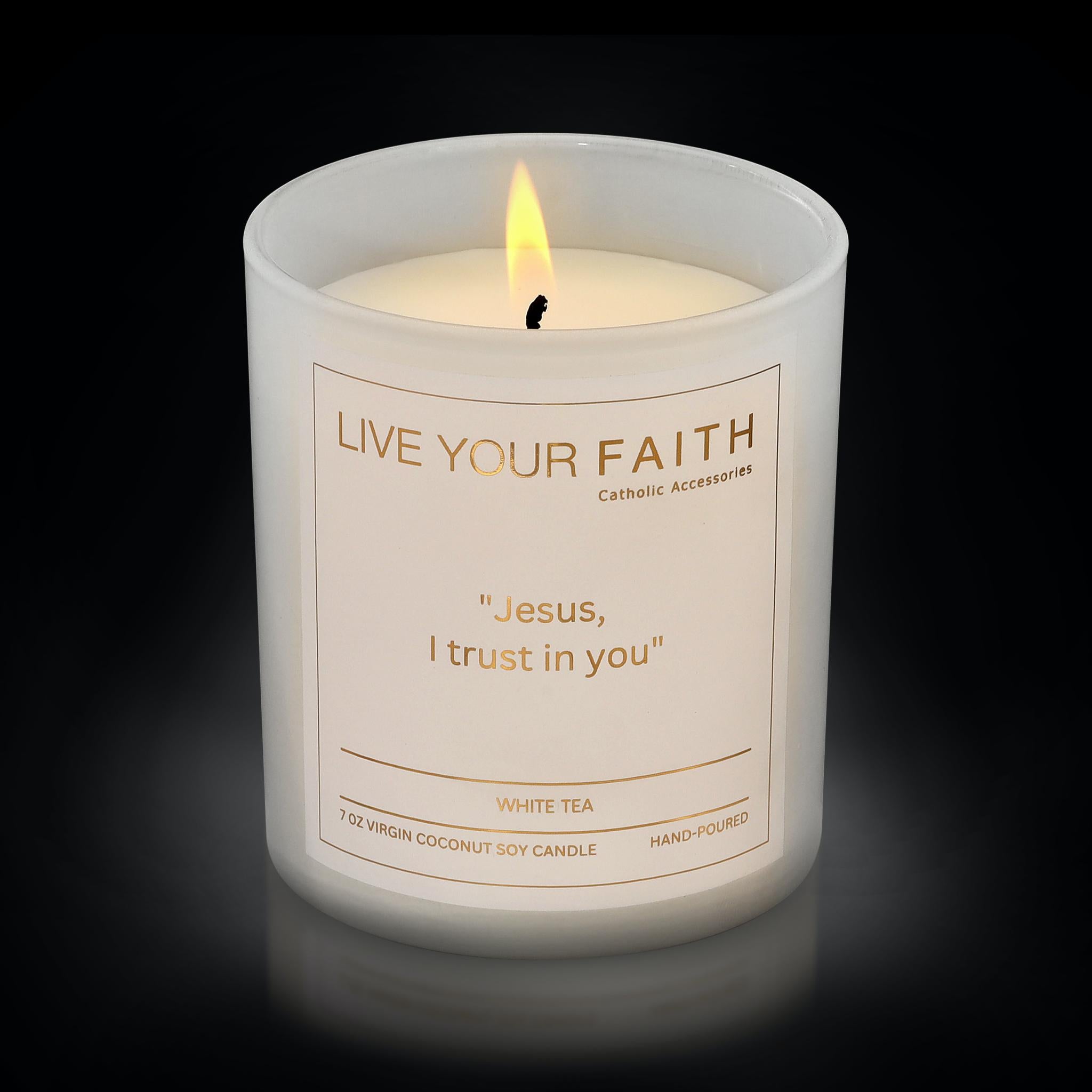 catholic prayer candle with the words Jesus I trust in you in white tea scent