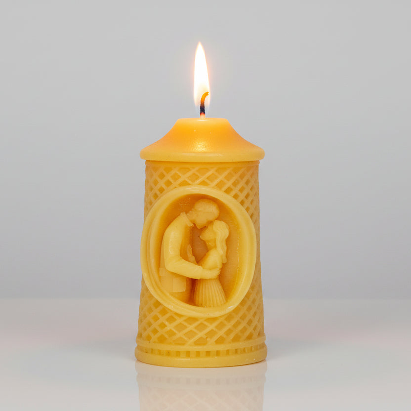 100% pure beeswax candle with couple image on white background