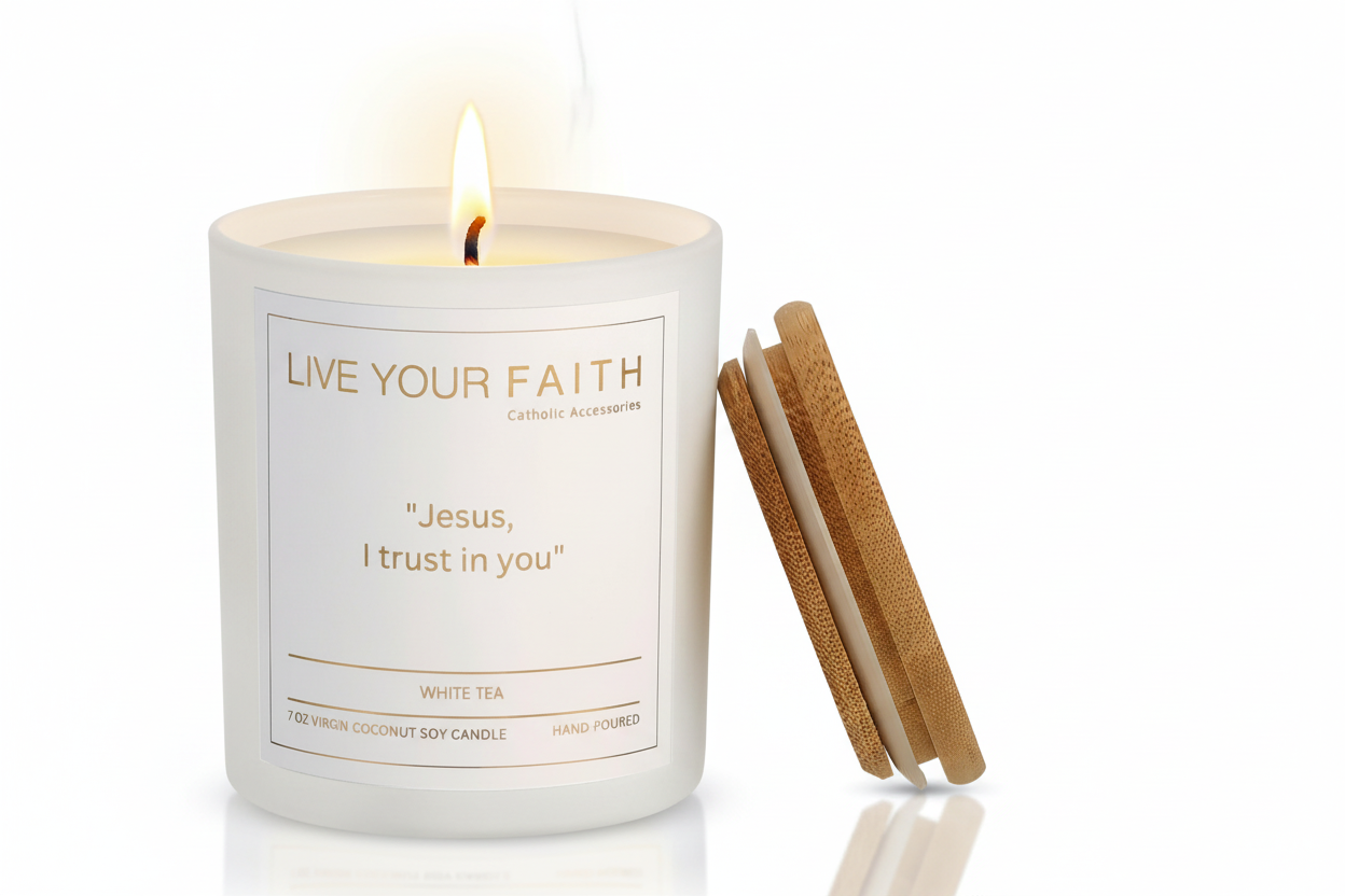 White candle with "Jesus I trust in You Prayer" on a white background