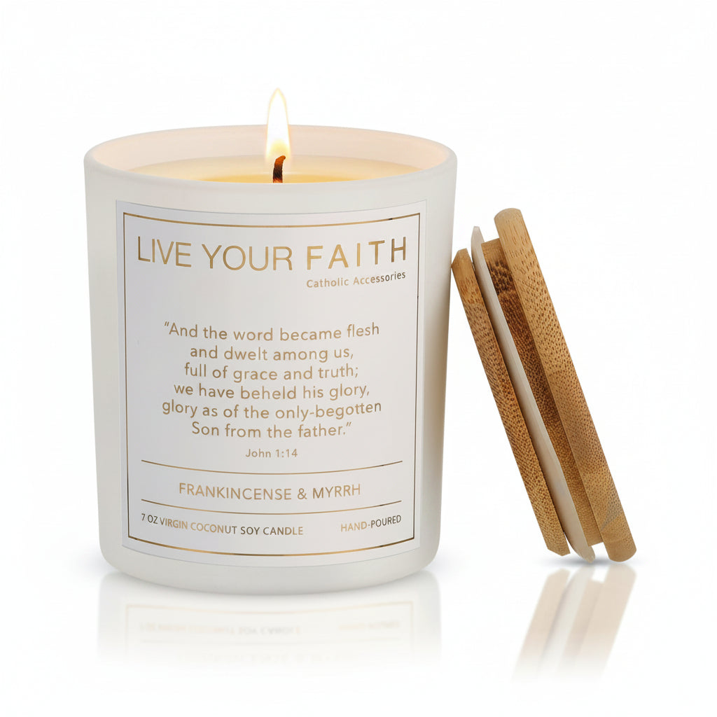Candle with 'Live Your Faith' text and wooden lid on a white background