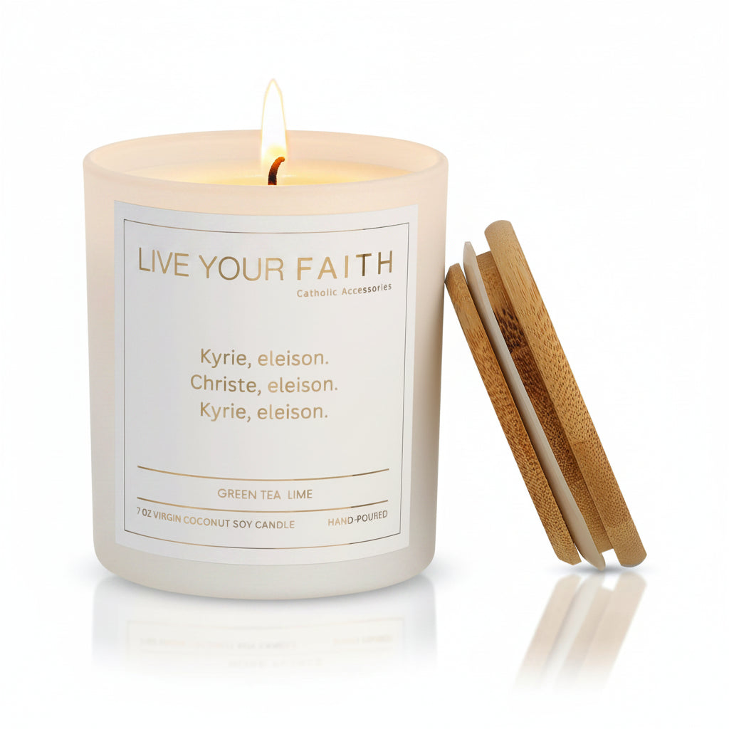 Kirie Eleison Candle in a 7oz white matte jar and a white paper label with gold foil made by live your faith Catholic