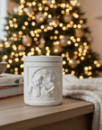 White ceramic container with nativity scene design on a living room background