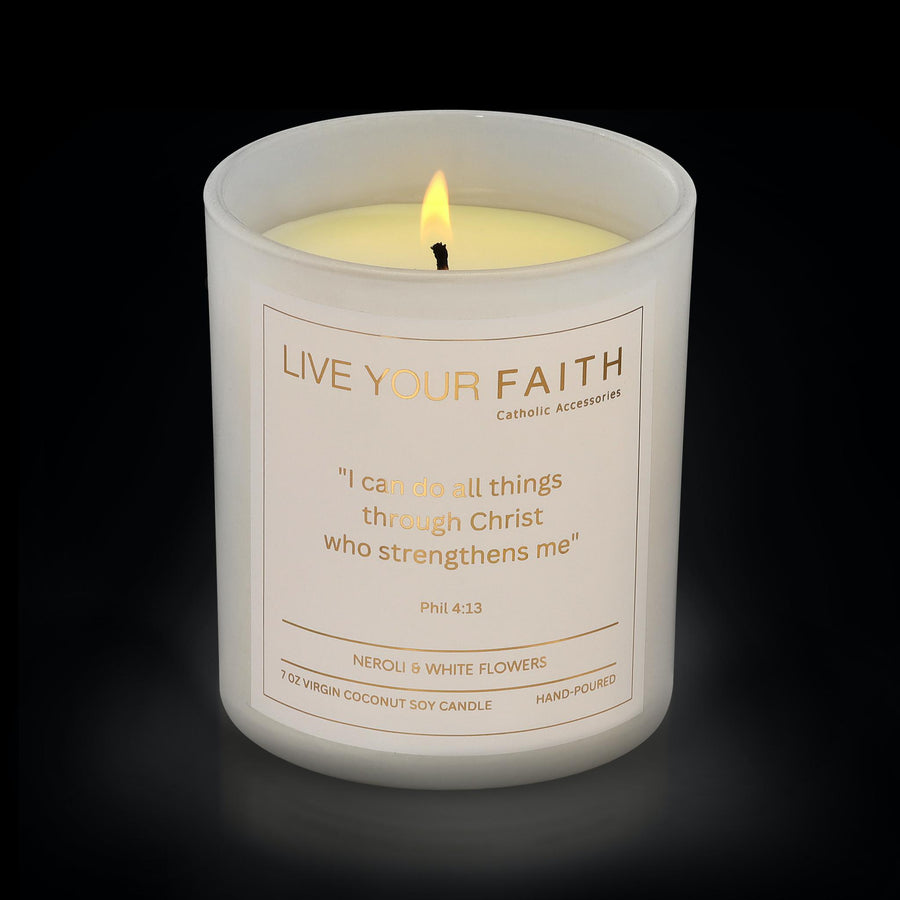 catholic prayer candle with the phrase from Phil. 4:13 in  neroli and white flowers
