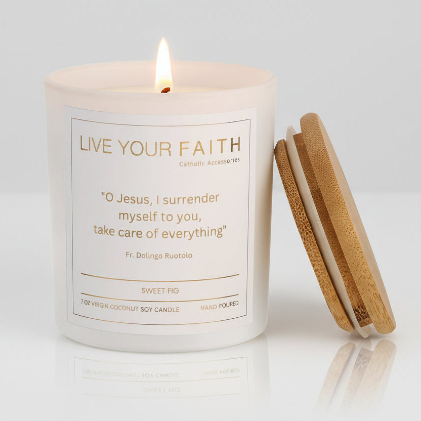 Candle with wooden lid and the surrender novena prayer text on a white background