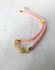 Gold Cubic Zirconia and pink Angel wing Bracelet